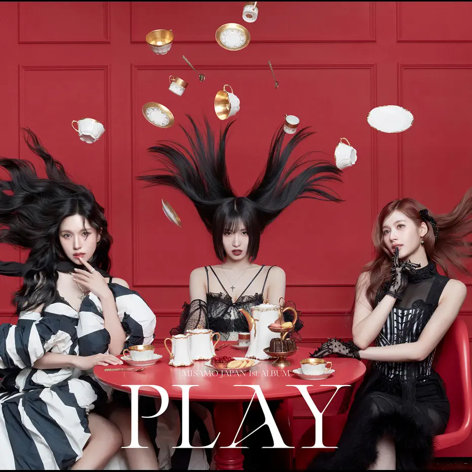 Three women with dramatic hairstyles pose at a red-themed table set with teacups and pastries, with floating teacups above them.