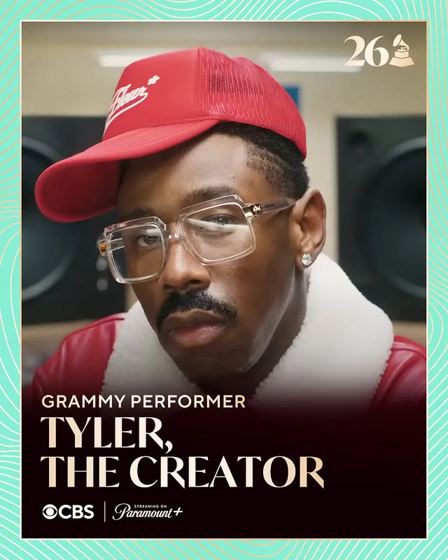A close-up portrait of a man with glasses and a red cap, wearing a red jacket. Text overlays indicate he is a Grammy performer named Tyler, the Creator.
