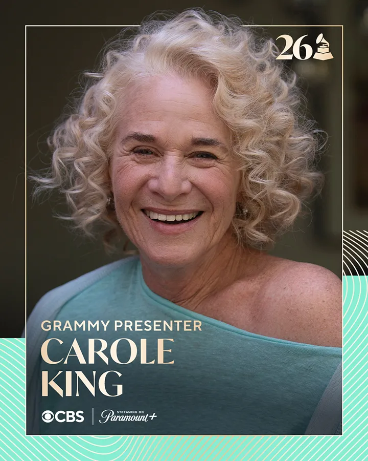 A smiling woman with curly hair wearing a light blue top, featured as a Grammy presenter.