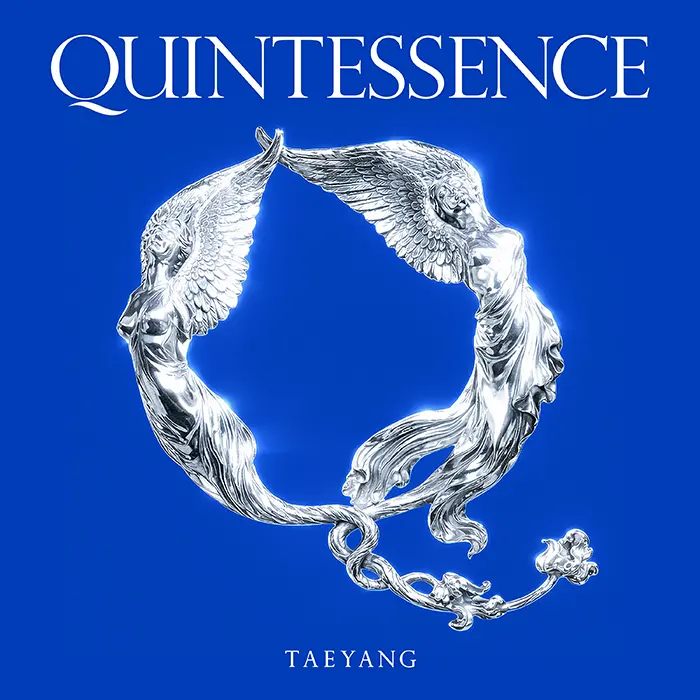 Album cover for 'Quintessence' by Taeyang, featuring two angelic figures with wings intertwined, set against a blue background.