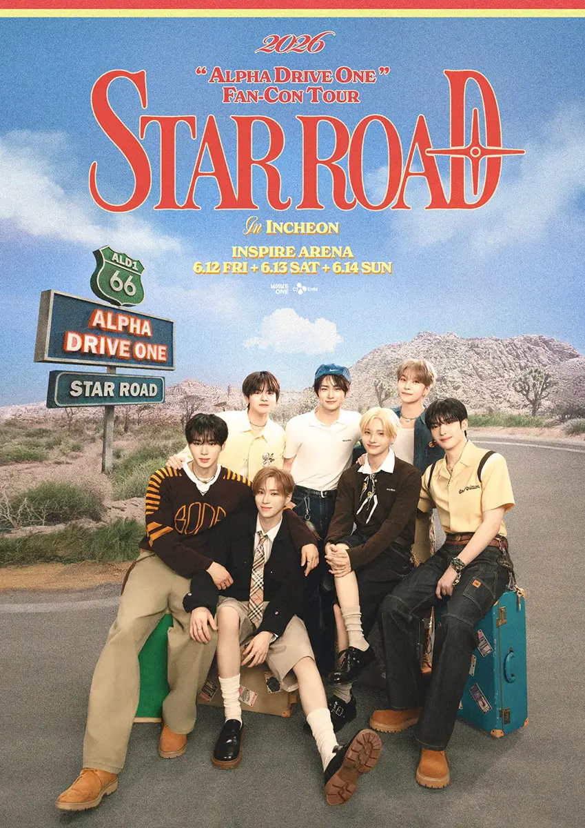 Promotional poster for the 'Alpha Drive One' Fan-Con Tour titled 'Star Road' featuring a group of eight individuals posing together, set against a desert landscape. The poster includes tour details for an event in Incheon, at Inspire Arena on June 12-14, 2026.