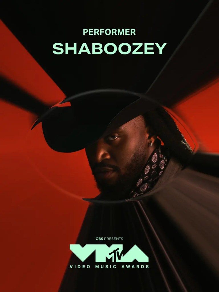 A promotional image for the MTV Video Music Awards featuring artist Shaboozey, styled with a hat and a bandana, set against a vibrant red background.