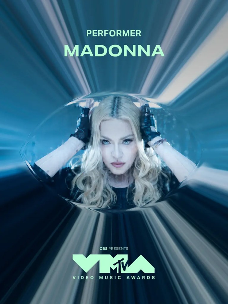 A promotional image for the MTV Video Music Awards featuring a performer in a futuristic style, with long blonde hair and gloves, titled 'Madonna.'
